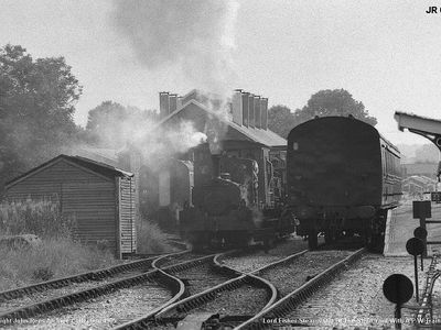 Lord Fisher steams out of the shed yard with a pway train 1985